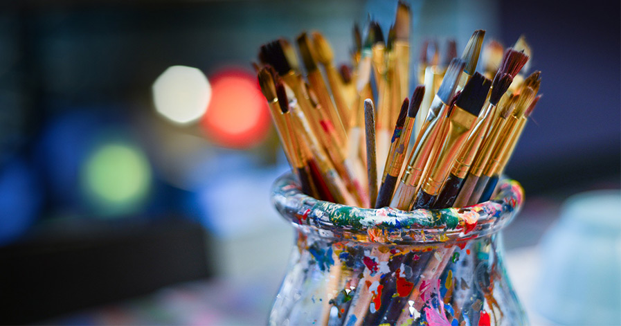 Paintbrushes in a bowl